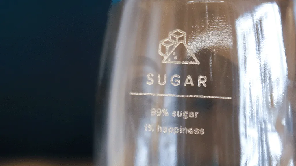 photo of laser marking on glass bottle