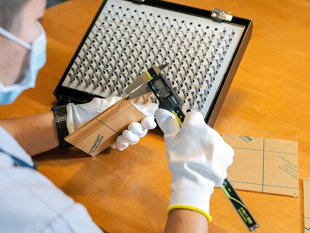 photo of measuring acrylic sheet thickness using mitutoyo digital caliper