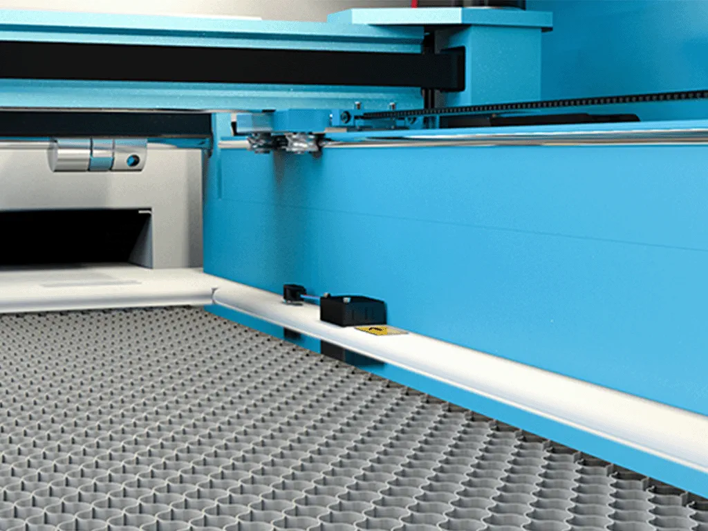 Close-up photo of auto-focus sensor of NOVA laser cutting machine